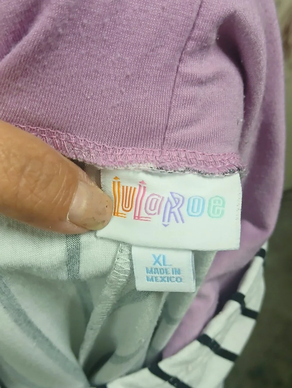 LuLaRoe Lavender Hoodie with Black-and-White Striped Raglan Sleeves